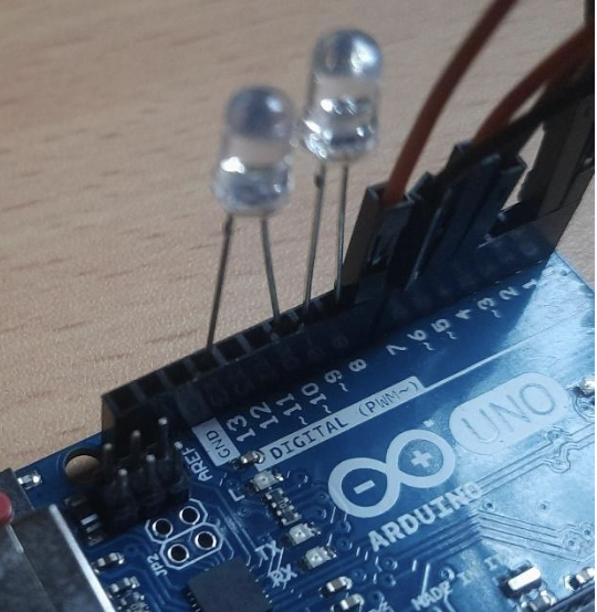Step 6,7  Connect the positive and negative terminal of one LED to Pin 11 and the GND of the Arduino respectively.| Connect the positive and negative terminal of the other LED to Pin 9 and Pin 10 of the Arduino respectively.