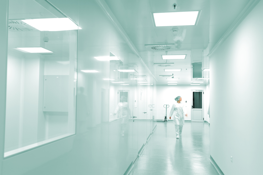 Modern bright factory interior with working people in motion-2